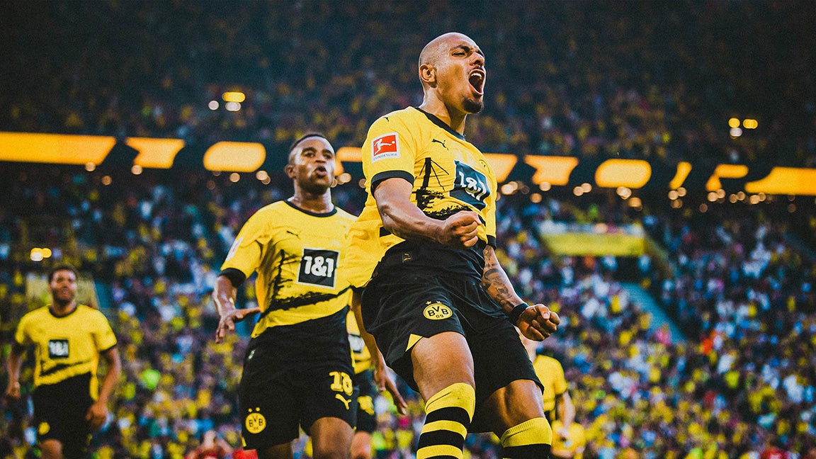 L'image montre la marque du BVB Borussia Dortmund sur les maillots des joueurs.