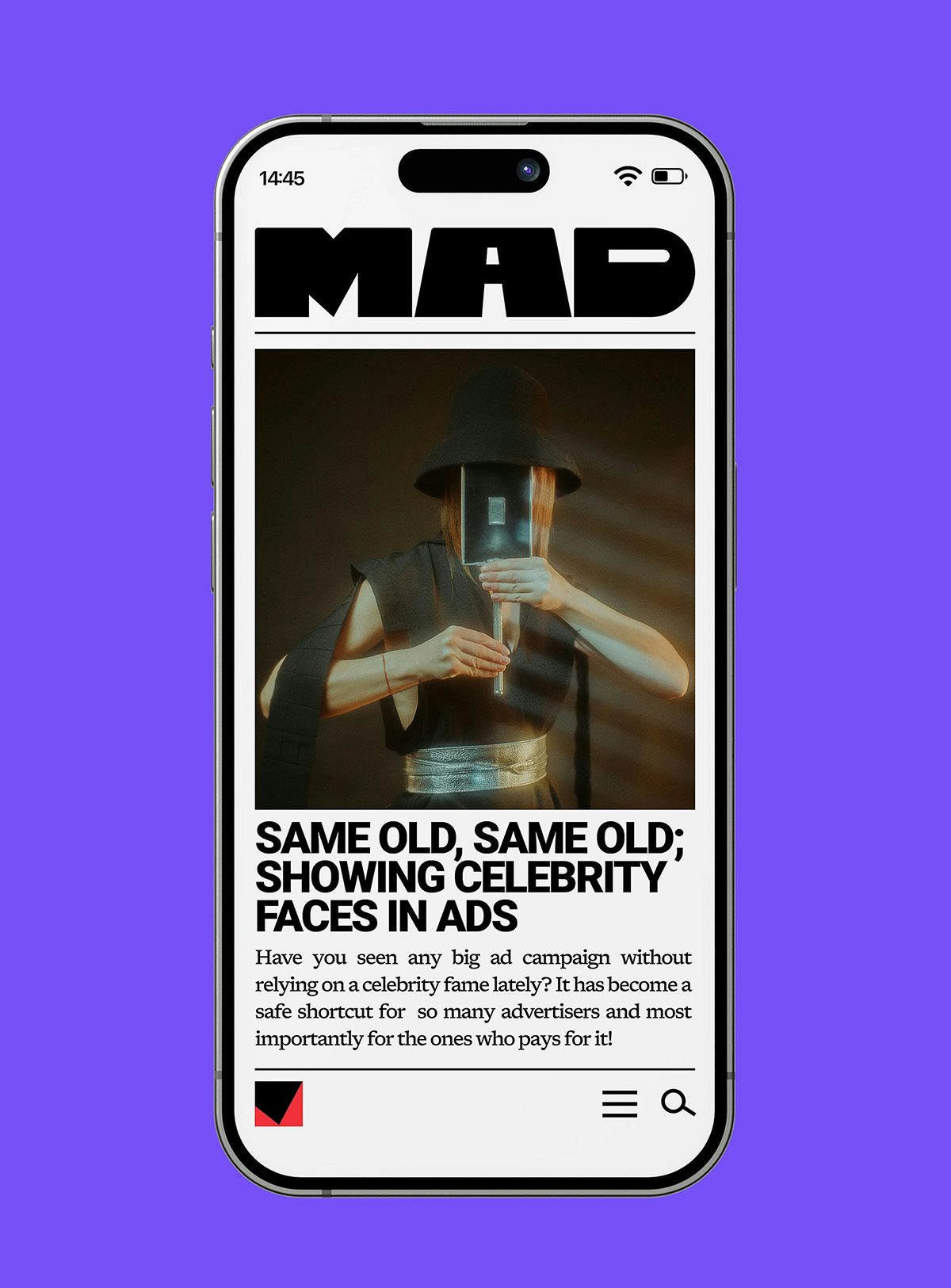 Écran de smartphone montrant le site Web de la plateforme d'informations MAD avec un article intitulé « Toujours pareil, toujours pareil, avec des visages de célébrités dans les publicités »